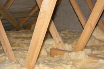 Insulation around some joists